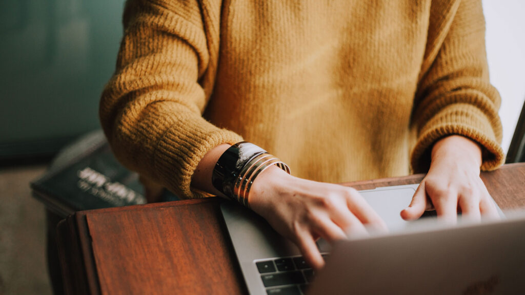 woman researching on computer